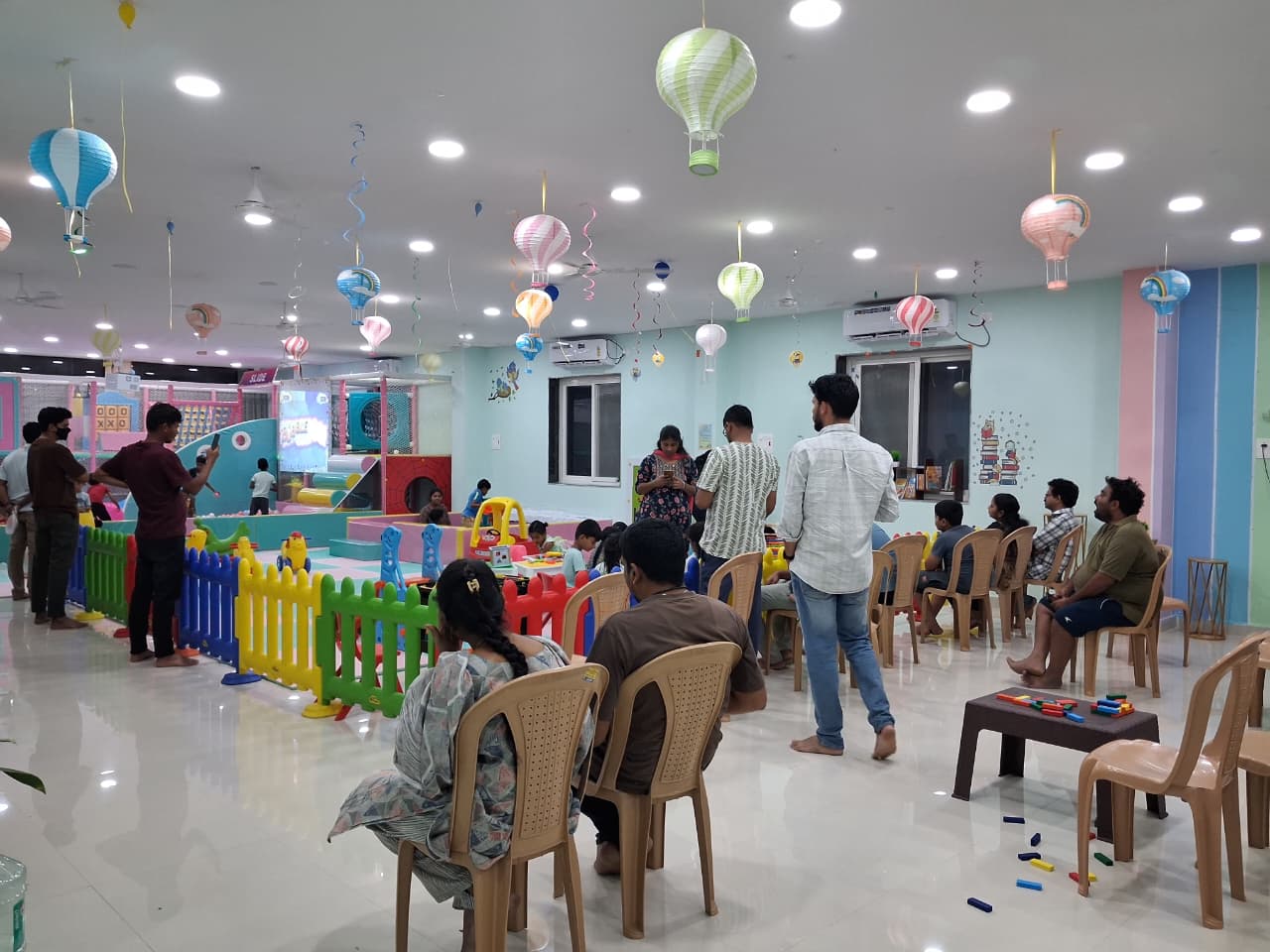 Families gathered inside Cocomelos Kids Play Zone in Boduppal